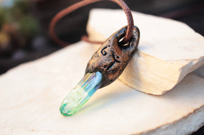 Handmade polymer clay fantasy pendant in green and bronze