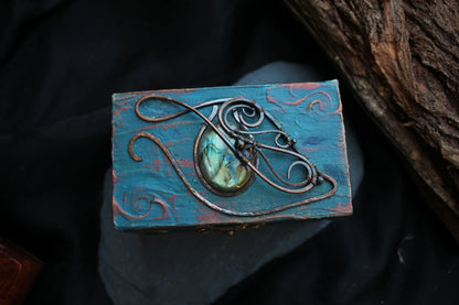Fantasy wooden RPG storage chest decorated with a labradorite gemstone