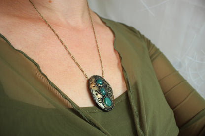 Unique handmade magical amulet necklace with rustic fantasy design