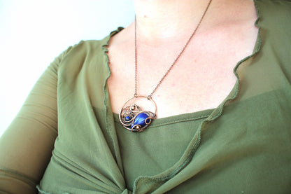Boho style artisan necklace with natural stone and copper wire wrapping design