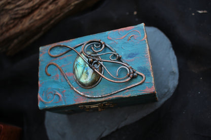 Wooden dice storage box decorated with a natural labradorite gemstone
