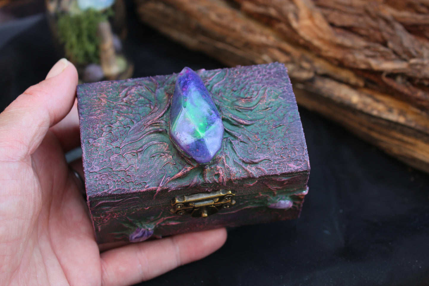 Magical wooden treasure chest with glowing resin crystal and gothic style