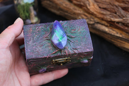 Magical wooden treasure chest with glowing resin crystal and gothic style
