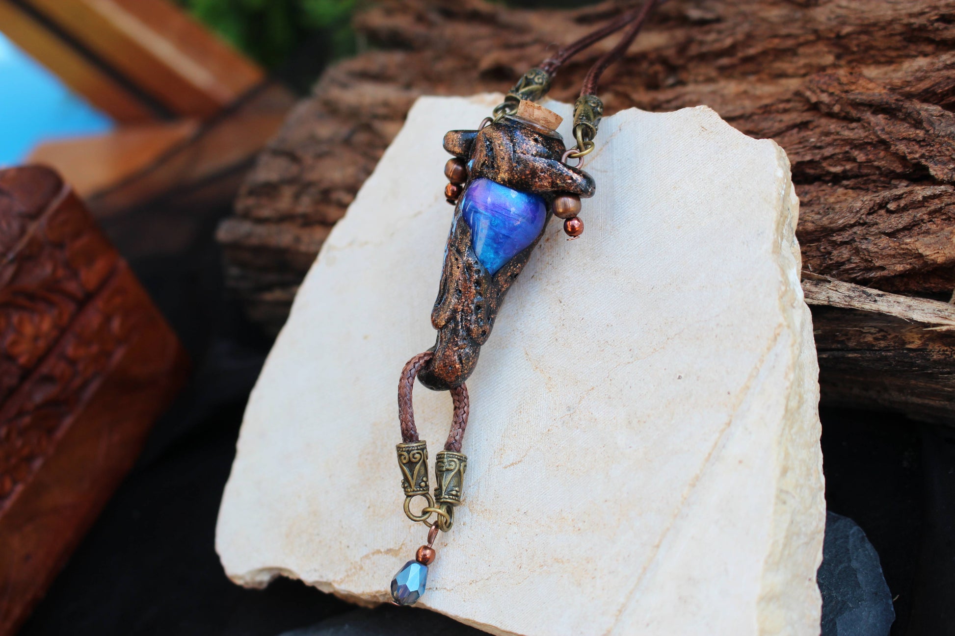Forest inspired fantasy jewelry with potion bottle charm and beads