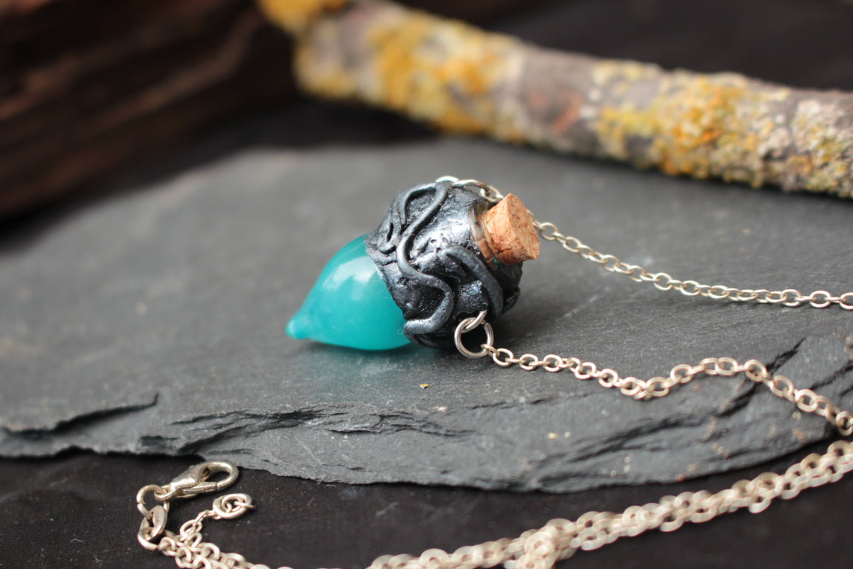 Turquoise potion bottle necklace with gemstone ready for gifting