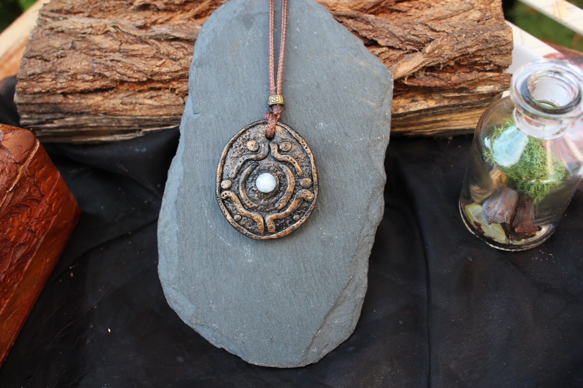 Handmade Moonstone pendant with detailed sculpting