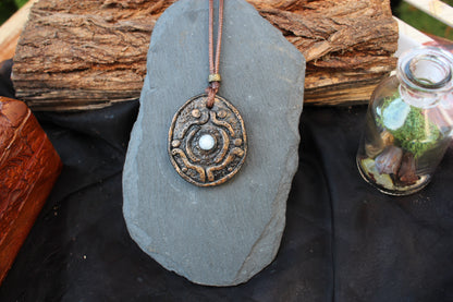 Handmade Moonstone pendant with detailed sculpting