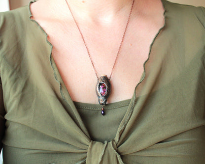 Handmade fantasy necklace featuring artificial moss and a forest-inspired pendant