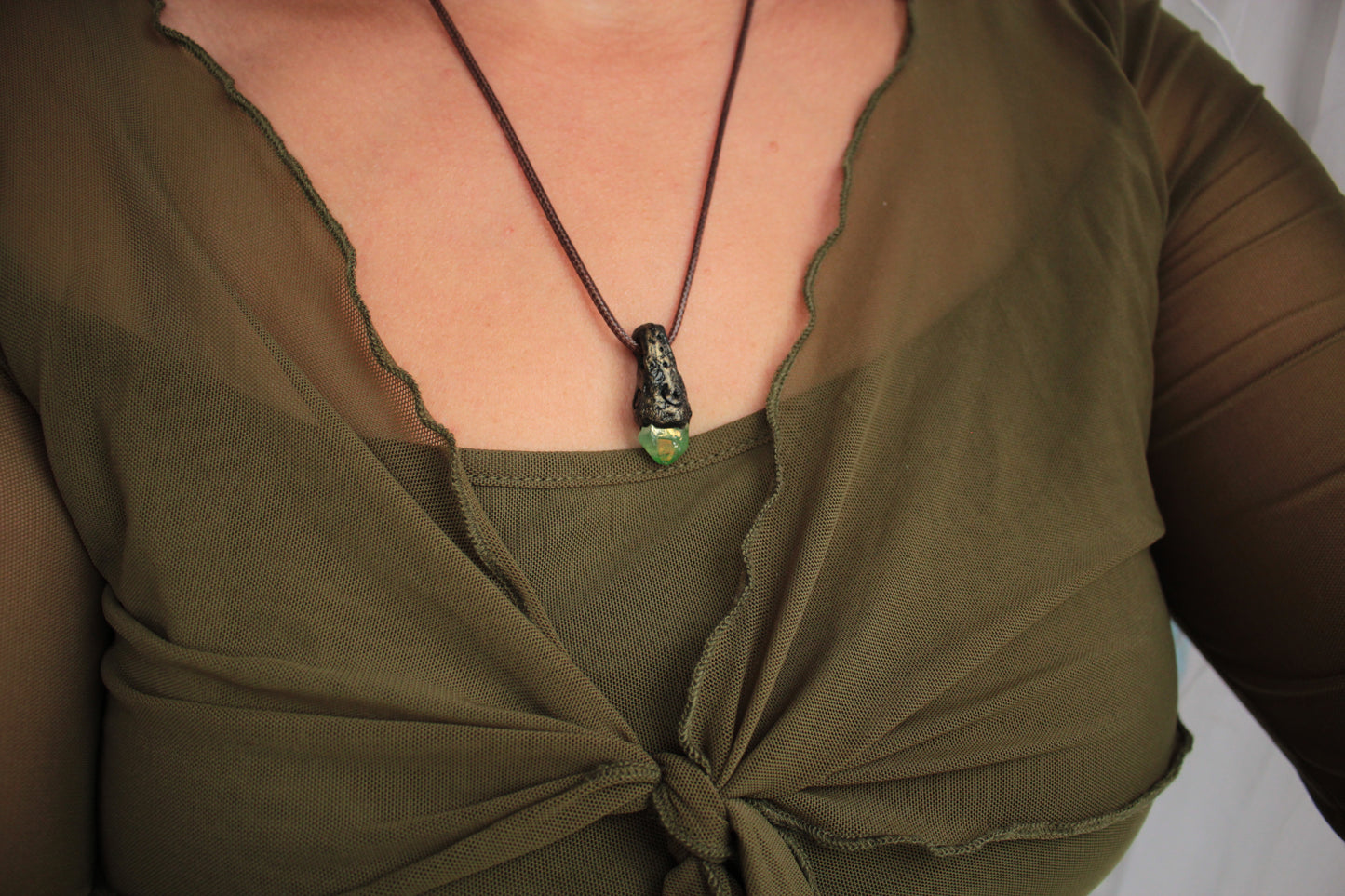 Handcrafted fantasy keepsake necklace with a magical crystal centerpiece