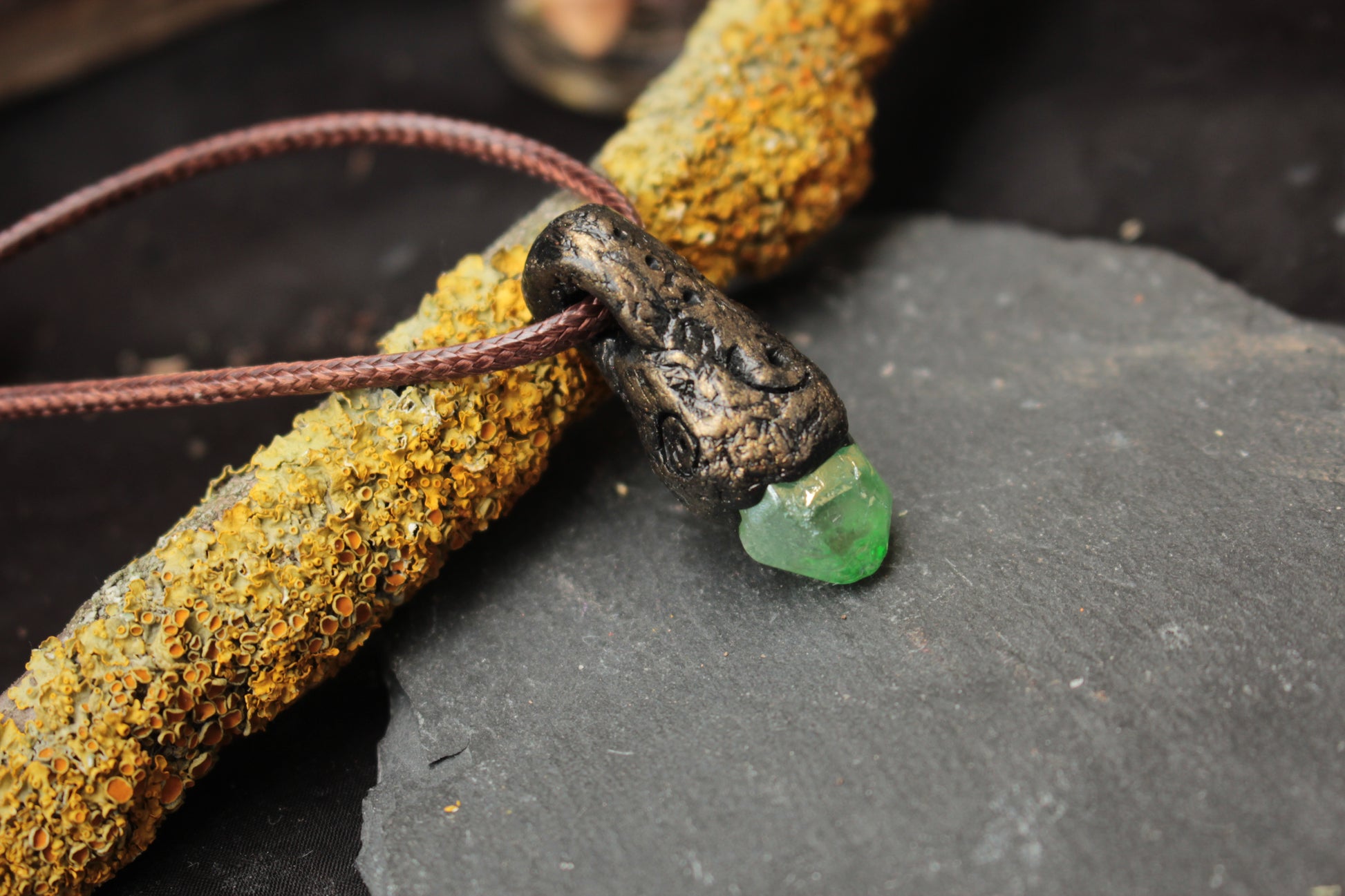 Fantasy charm necklace with a handcrafted green crystal pendant