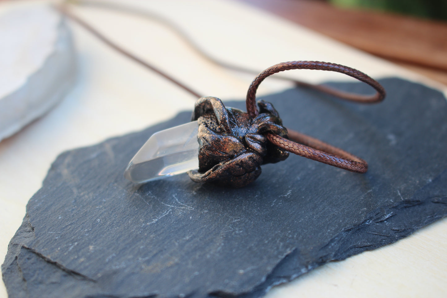 Nature inspired pendant with Quartz Crystal and leaf design