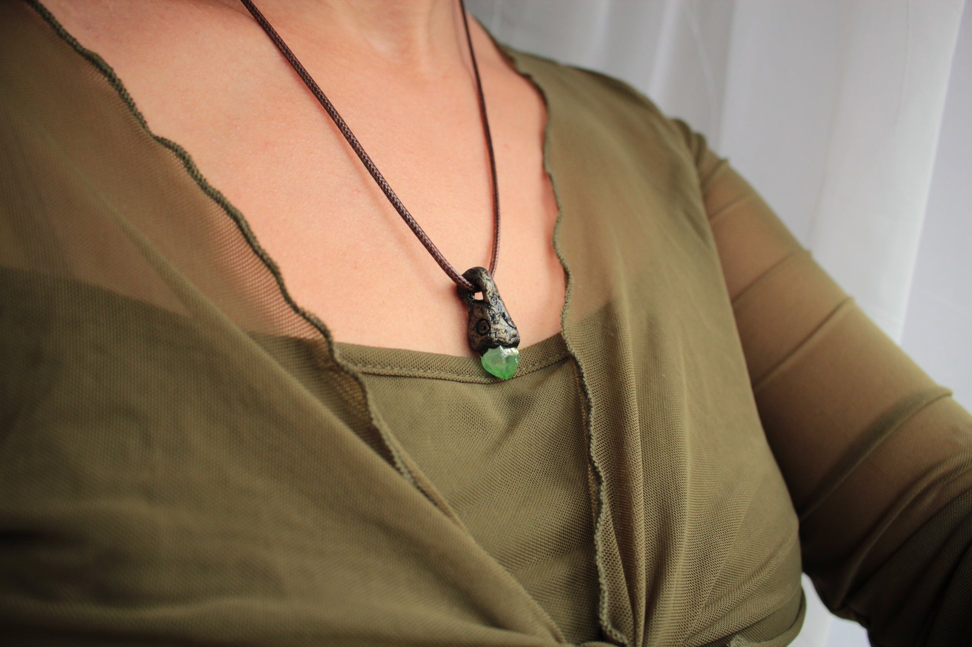 Handmade crystal jewelry reflecting the beauty of enchanted forests