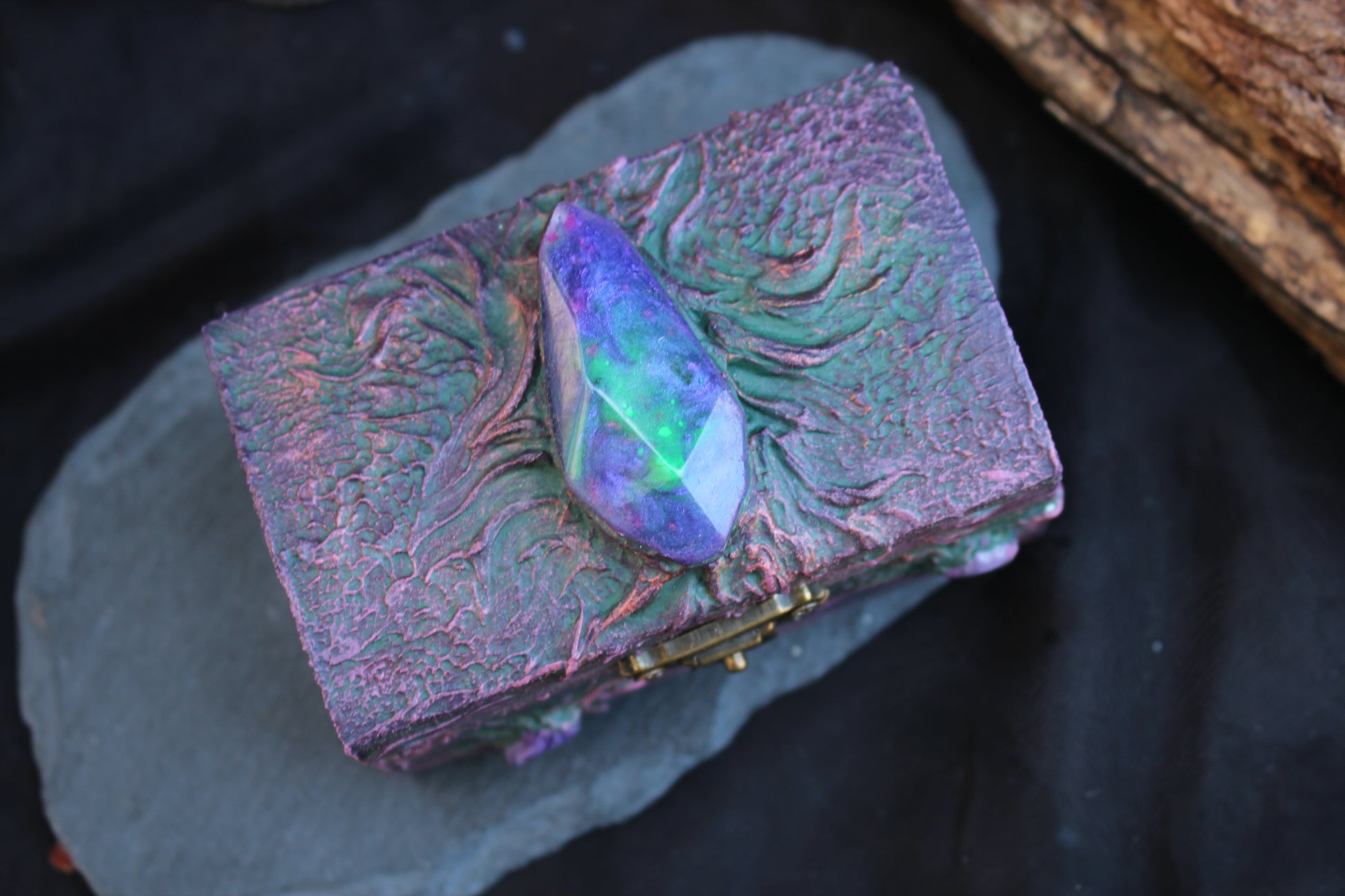 Handmade pagan keepsake box with glowing crystal