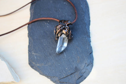 Handmade pendant featuring a genuine Quartz Crystal