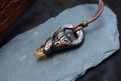 Handmade fantasy talisman necklace inspired by tabletop RPG adventures