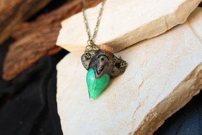 Fantasy RPG necklace featuring a handcrafted glowing potion charm