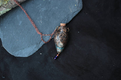 Rustic fantasy necklace with a nature-inspired pendant