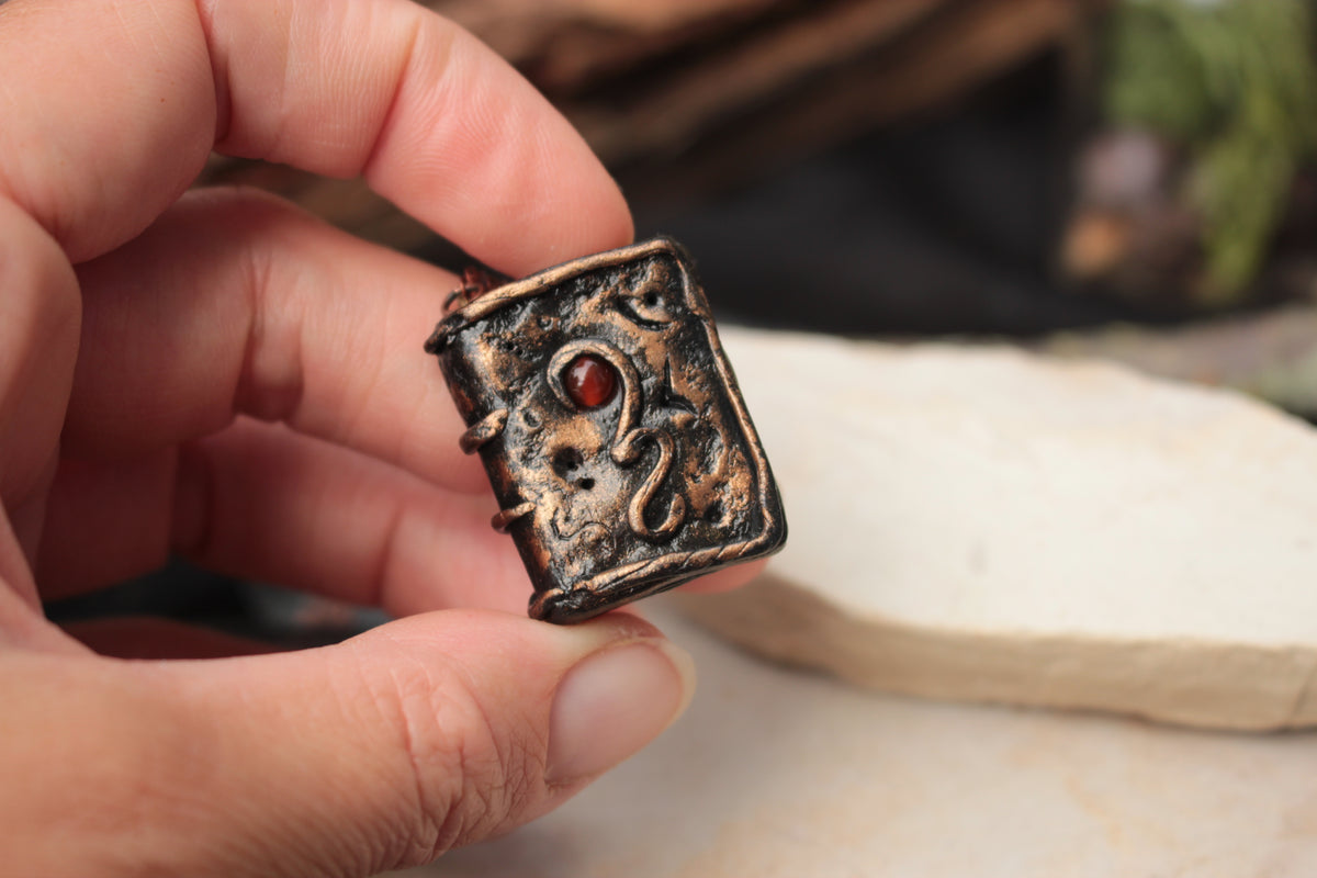 Rustic miniature magic book necklace with carnelian gemstone