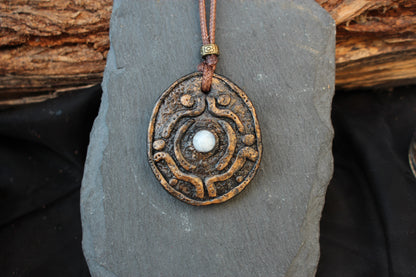 Rustic fantasy necklace inspired by ancient magical relics
