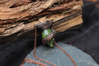 Rustic handmade potion bottle necklace inspired by ancient druid relics