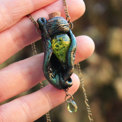 The Breath of the Forest druid pendant necklace with green vial and leaf details
