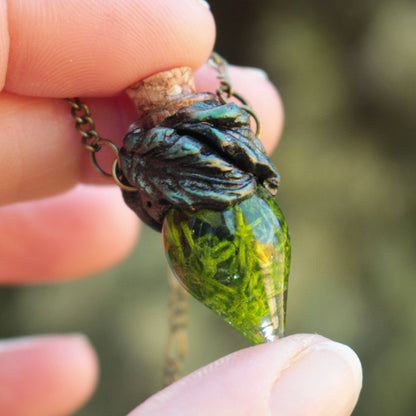 Green moss vial pendant necklace with bronze forest-inspired details
