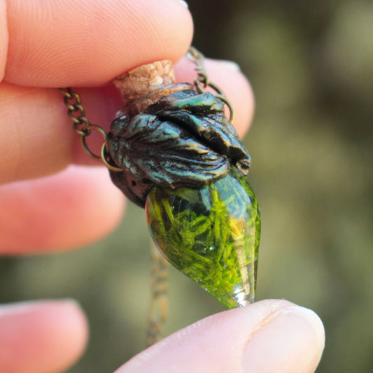 Green moss vial pendant necklace with bronze forest-inspired details