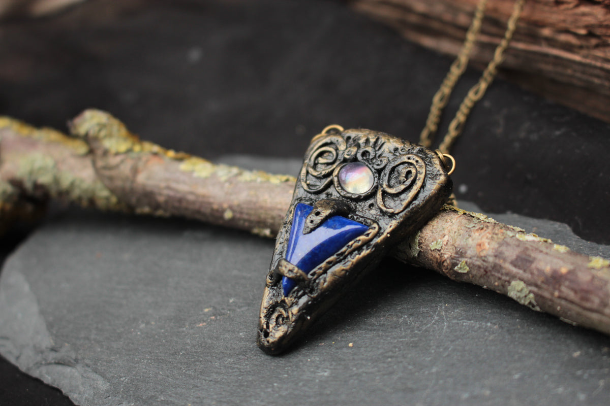 Blue gemstone pendant from The Lost Talisman fantasy jewelry collection