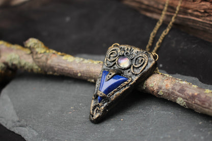 Blue gemstone pendant from The Lost Talisman fantasy jewelry collection