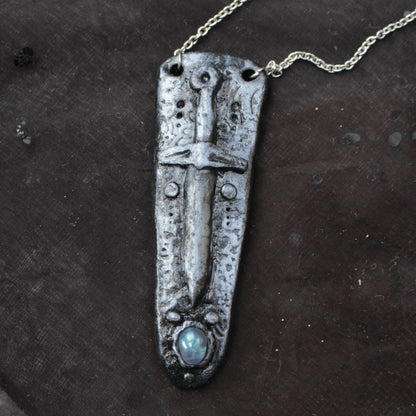 Handmade fantasy sword necklace with a gemstone pendant