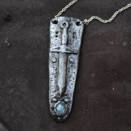 Handmade fantasy sword necklace with a gemstone pendant