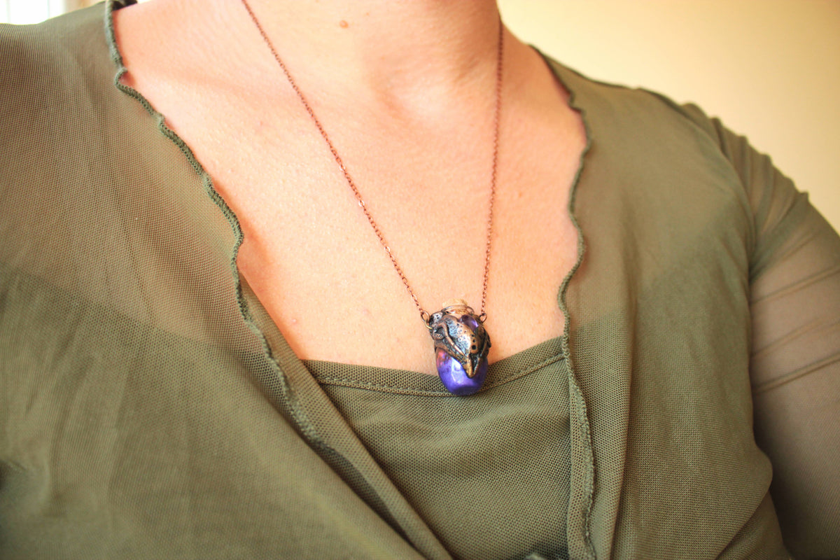 Handmade violet potion amulet necklace inspired by ancient magical artifacts