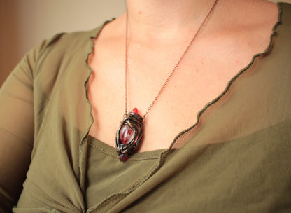 The Three Blood Crystal amulet, a handmade fantasy necklace inspired by an ancient legend