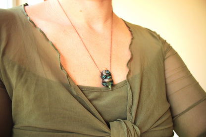 Tiny handmade potion necklace designed for lovers of druid, fantasy and woodland jewelry