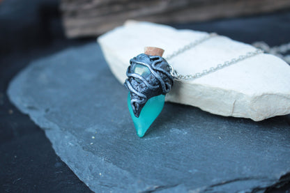 Blue turquoise bottle necklace with gemstone detail and silver chain