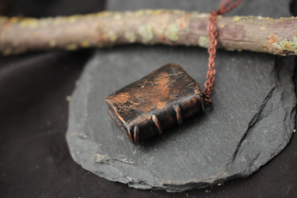 Witchy spell book necklace handmade from polymer clay
