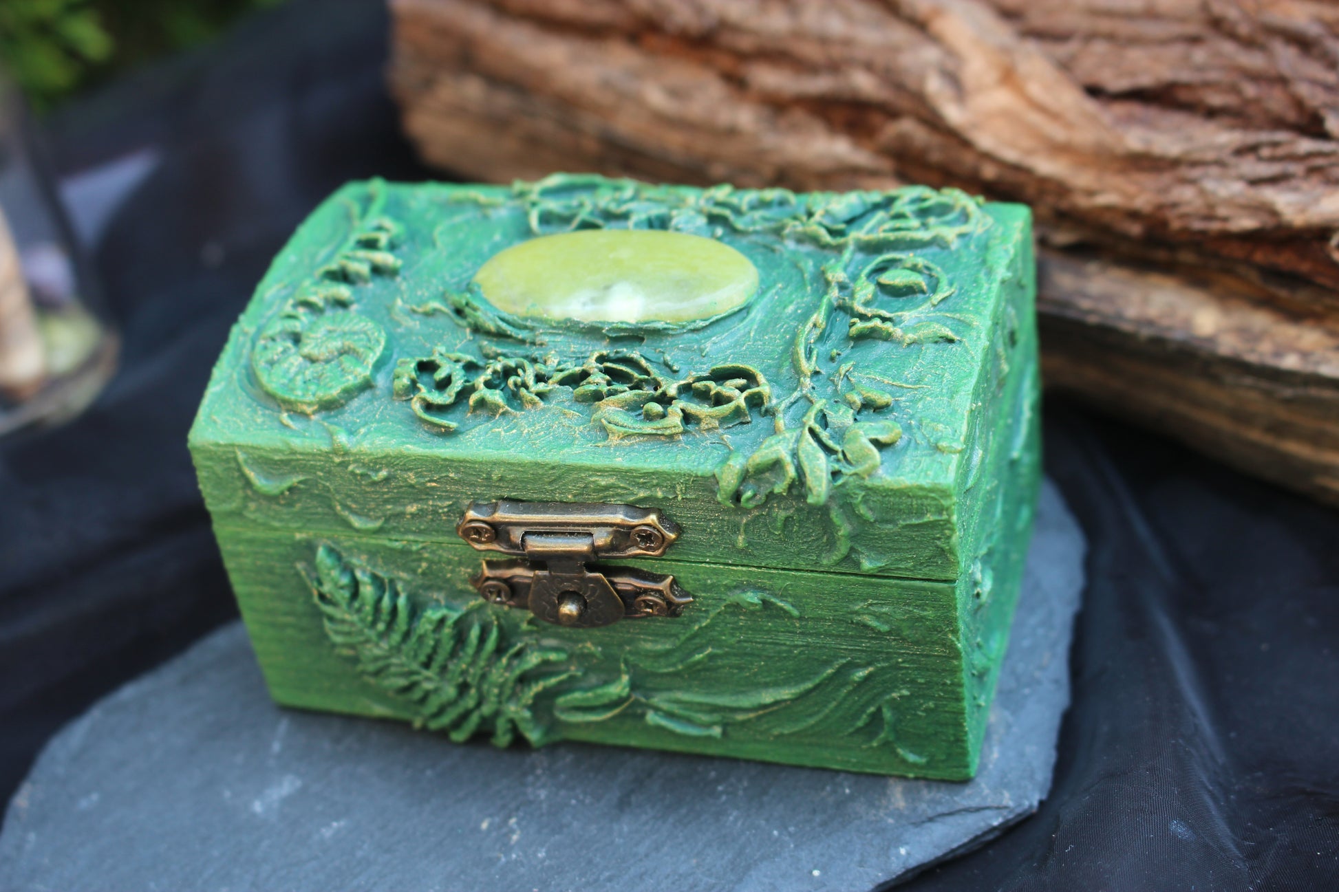 Wooden chest with crystal, feather and nature inspired decor