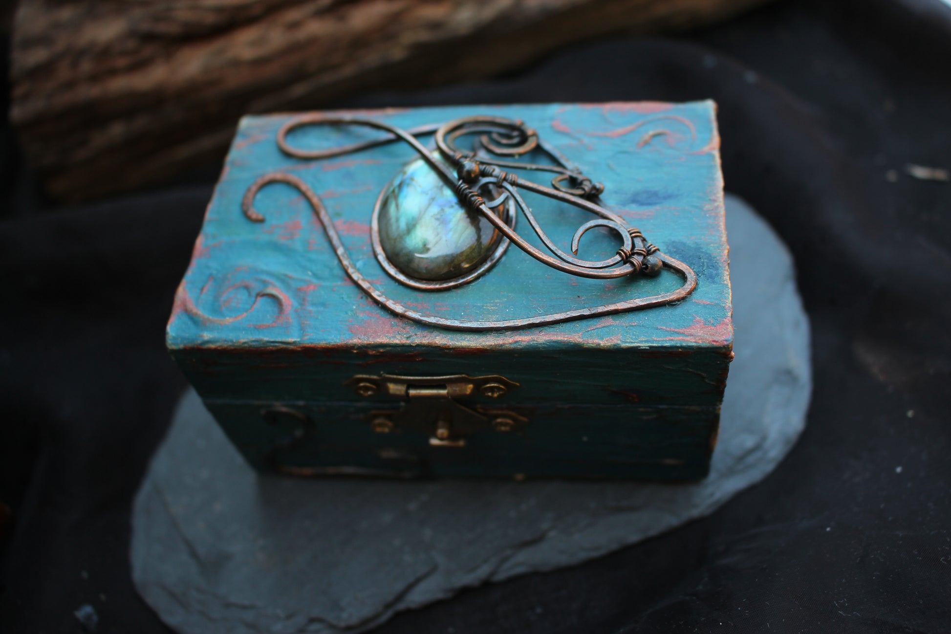 Wooden treasure chest for RPG dice with matching bronze metal dice set