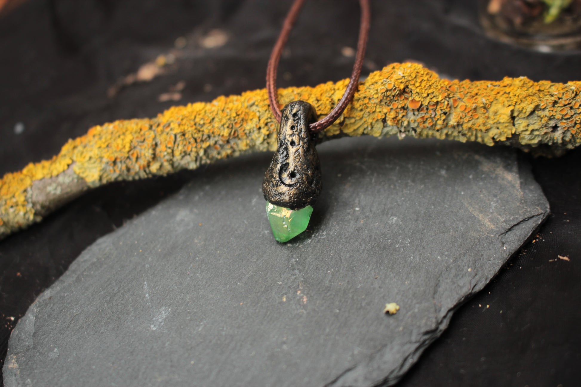 Artisan crafted crystal amulet necklace with a magical woodland aesthetic