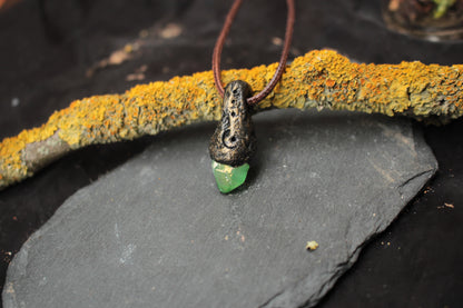 Artisan crafted crystal amulet necklace with a magical woodland aesthetic