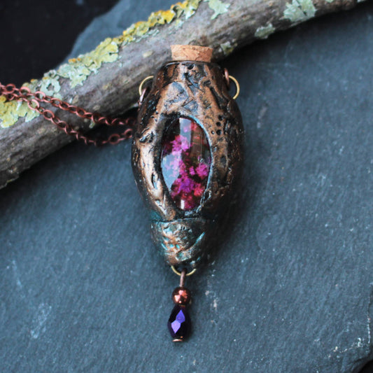 Handmade fantasy necklace with an intricate natural design