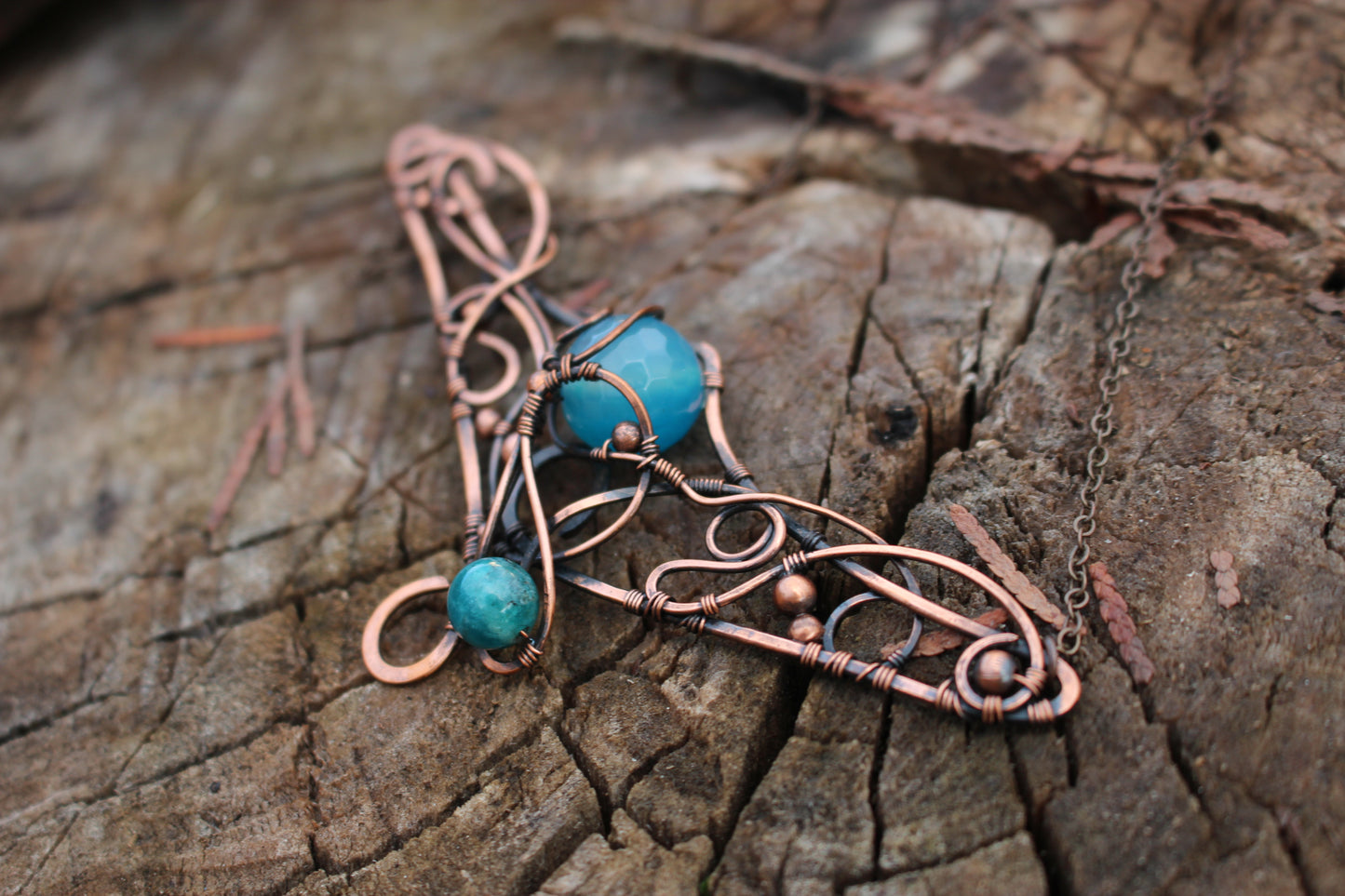 Close up of blue agate gemstone magical amulet pendant