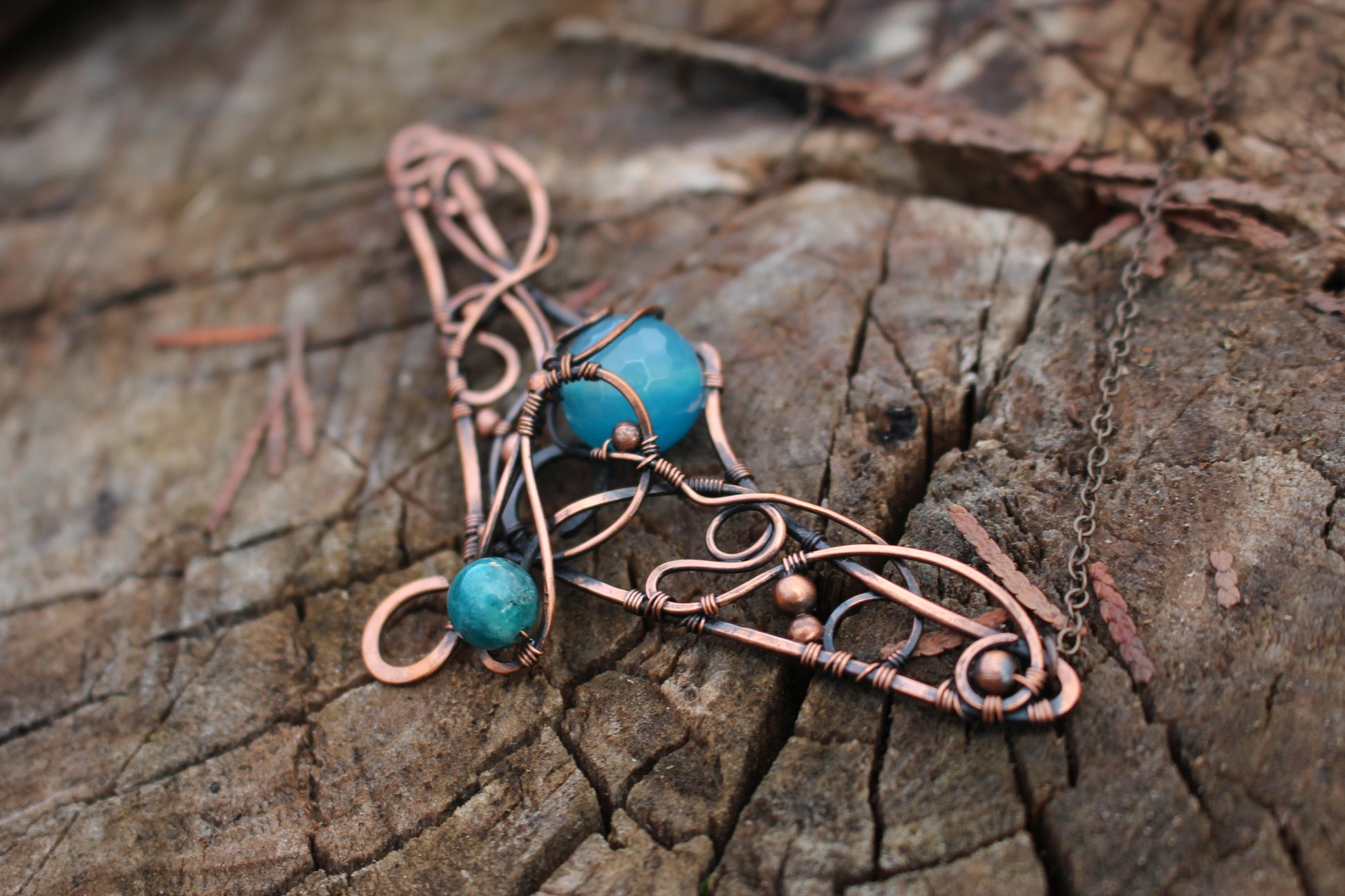 Close up of blue agate gemstone magical amulet pendant