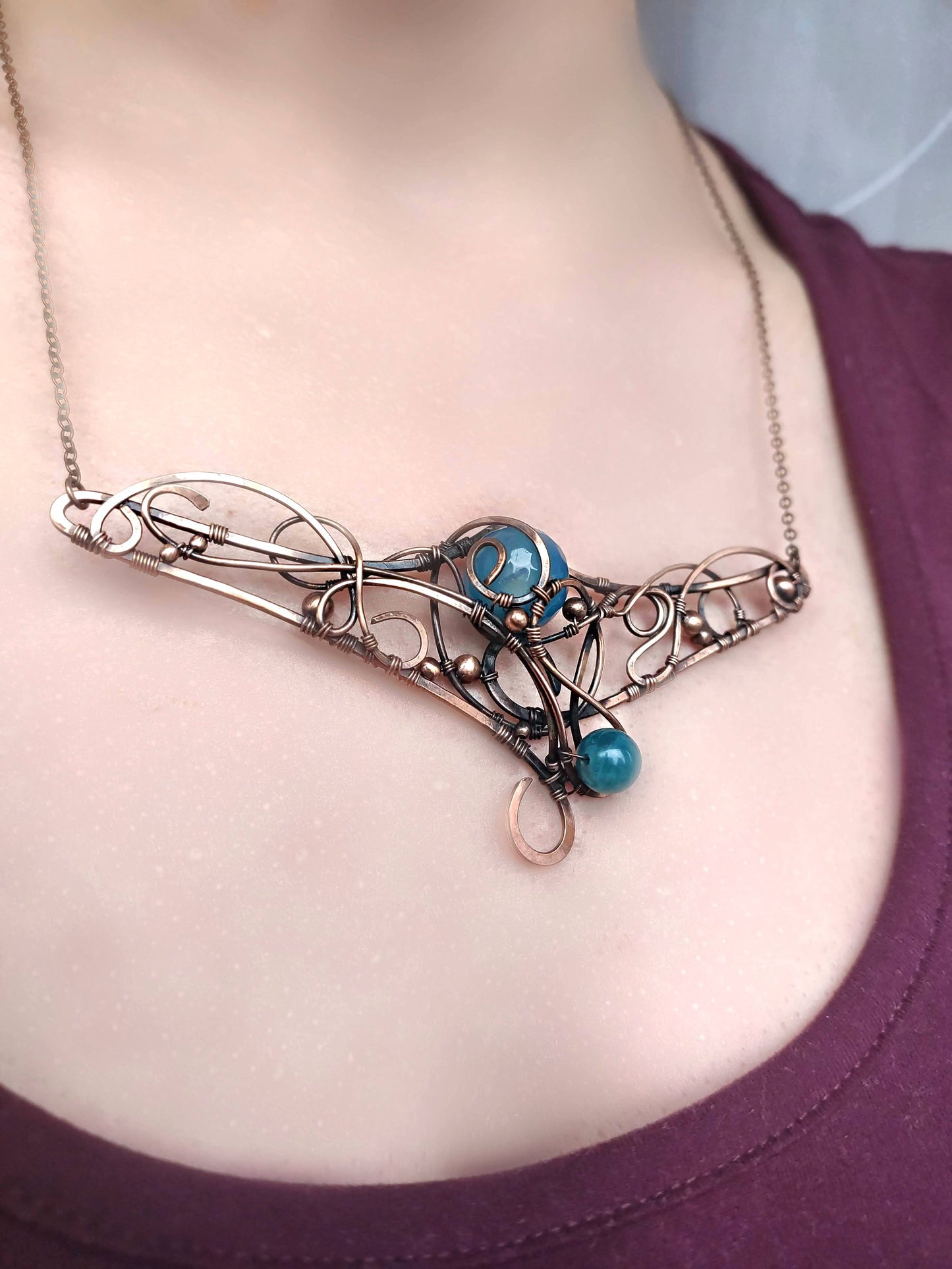 Blue agate talisman necklace detail showing wire wrapping craftsmanship
