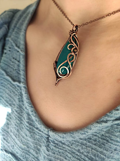 Detailed view of blue agate wire wrapped pendant necklace