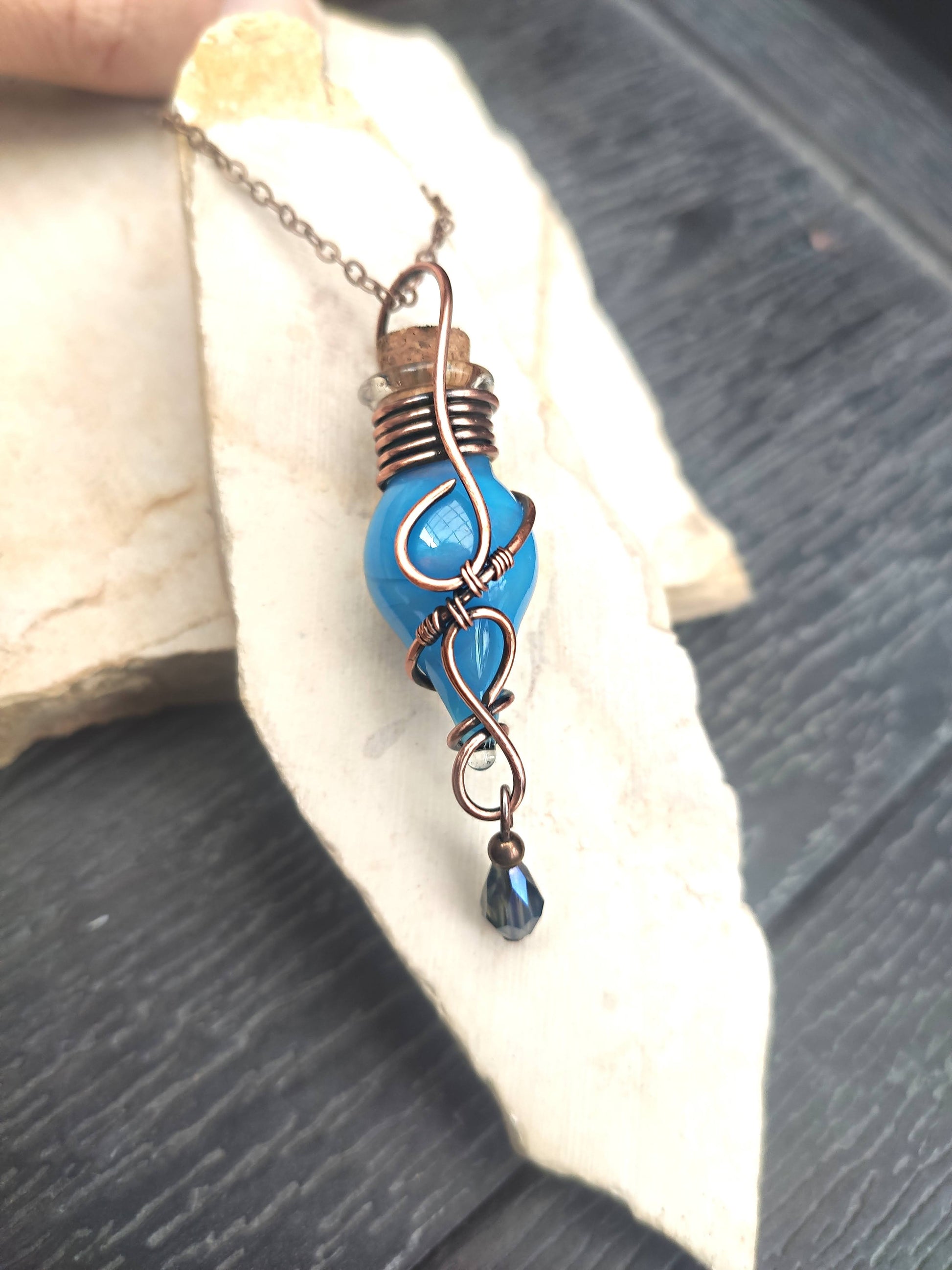 blue potion bottle necklace handmade magical vial jewelry for fantasy lovers