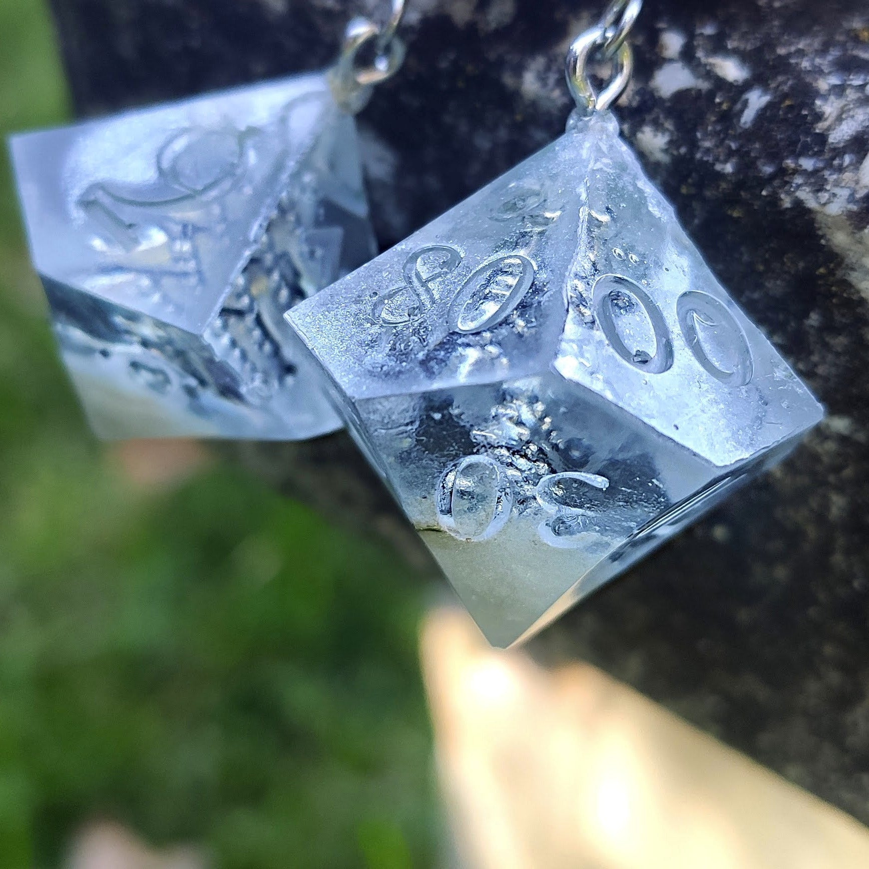 Fantasy style resin D10 dice earrings with miniature Christmas tree inside