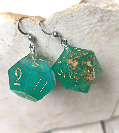 Glow-in-the-dark dice earrings for gamers and fantasy lovers