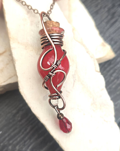 red potion bottle necklace handmade magical vial jewelry for fantasy lovers