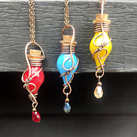 red blue yellow potion bottle necklace handmade fantasy magic vial jewelry